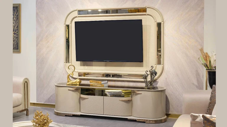 Paris Kad TV stand: cream console below a large framed TV panel with gold edging that surrounds the wall-mounted screen