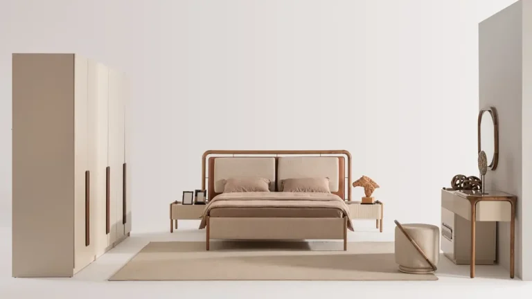 Woody bedroom set with a tall cream wardrobe with slim walnut handles beside a matching bed